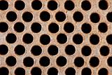 Rusty iron grate - element of industrial heat exchanger