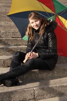 Happy girl with umbrella