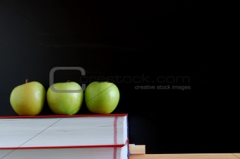 blank blackboard with apples