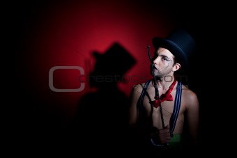 Man with whip in top hat