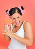 Beautiful happy teenage girl blowing soap bubbles and having fun