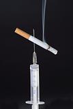 cigarette on needle