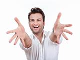 excited man in shirt with both arms outstretched toward camera - isolated on white