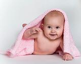 Baby Peeking From Under Pink Blanket