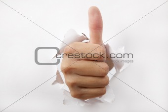 hand break through the white paper with Thumb up