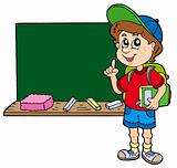 Advising school boy with blackboard