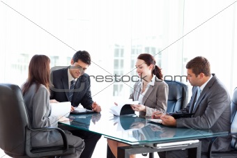 Four business people during a meeting