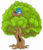 Big tree with blue bird in nest