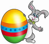 Easter bunny with colorful egg
