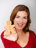Holding a Gingerbread cookie