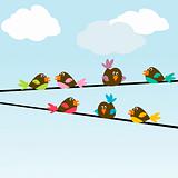 Colored stylized birds on wires