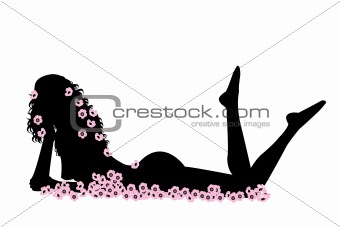 Naked sexy woman in the middle of pink flowers