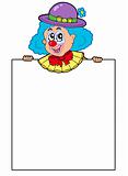 Clown holding blank board
