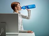 businesswoman drinking water