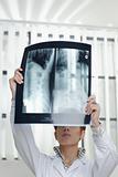 female doctor with radiograph
