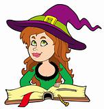 Cute girl witch reading book