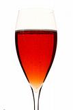 a red champage glass with alcohol