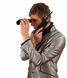 spy man using binoculars
