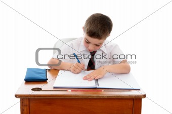 Little boy doing school work or homework