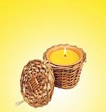 Christmas golden candle isolated on yellow background
