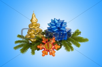 gift box with bow and christmas candle and star isolated on blue