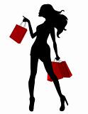 Silhouette of young woman carring bags