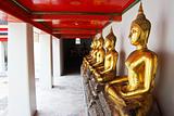 Row of Golden Buddha statue in Thailand Buddha Temple