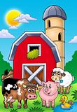 Big red barn with farm animals