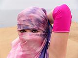 Arab dancer eyes through a veil