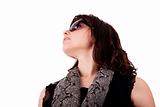 portrait of a young woman looking up with sunglasses, isolated on white background. Studio shot