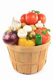 Vegetables in wooden bushel basket. 