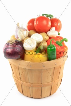 Vegetables in wooden bushel basket. 