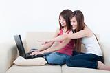 asian girls using laptop
