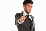 Young businessman ok symbol gesture, isolated on white background