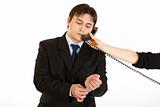Elegant young businessman talking on phone in hand of secretary
