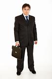 Full length portrait of young businessman holding  briefcase in hand
