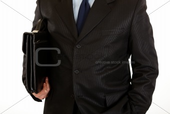 Businessman with  briefcase in hand. Close-up.
