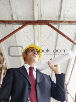 architect with building plans