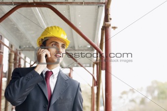 architect with mobile phone