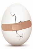 cracked egg with bandage