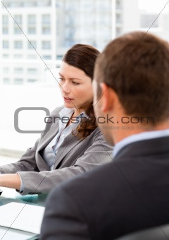 Rear view of a businessman during an interview with a female man