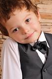 boy in a suit and bow tie