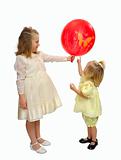 Two girls play with balloons.