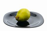 Pear on a black platte, isolated