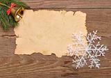 christmas decoration and old paper on brown