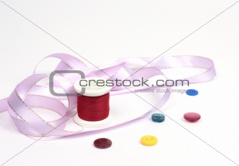 Threads with buttons and tape
