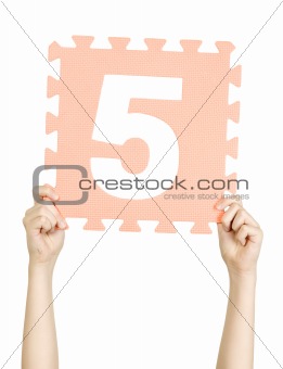 Child is holding five