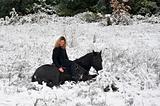girl and horse in snow