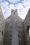 cross and historic walls