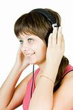 beautiful girl in headphones listens to music
